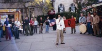 A crowd gathers to listen to a speaker at an anti-Columbus Day protest on Library Mall in 2000. 