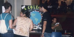 Students stopping at La Colectiva’s table at the 2003 Multicultural Orientation and Reception and student organization fair. 