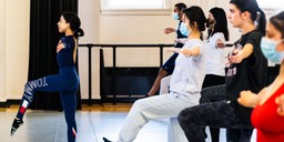 Professor Michelle Ramos teaching a dance class.