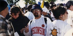 A UW student from La Colectiva marching in La Marcha en Washington on October 12, 1996.