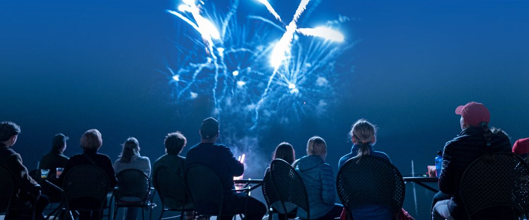 People enjoying the fireworks at the Terrace