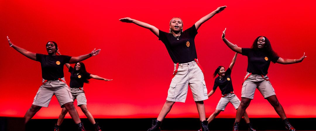 Members of Delta Sigma Theta Sorority, Inc. perform at the Multicultural Homecoming Yard Show. // Photo by Dave Stremikis ’13